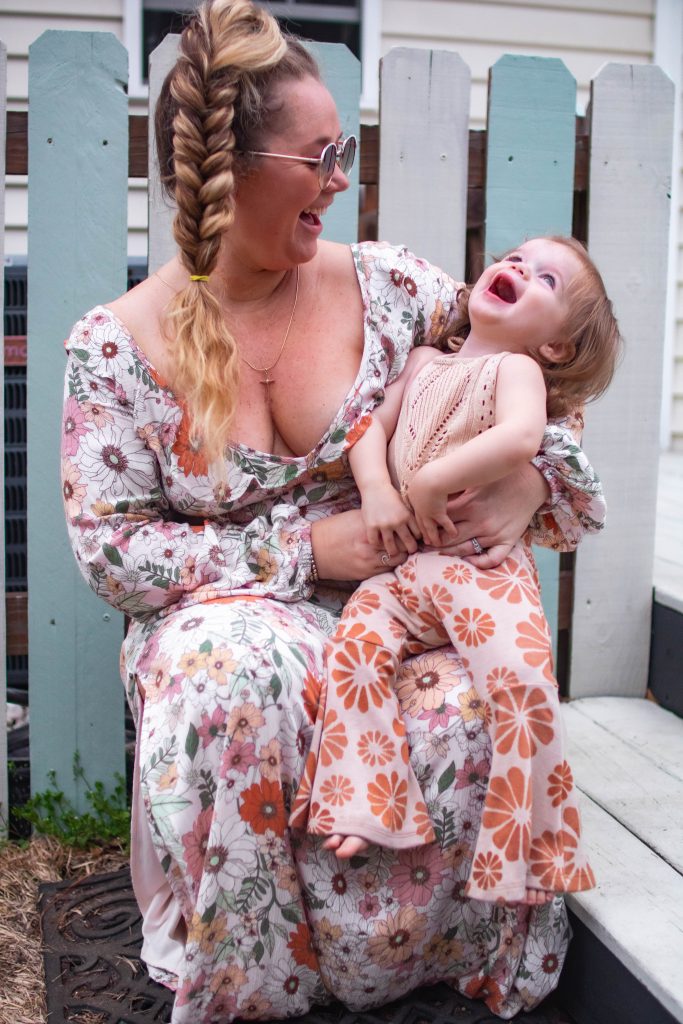 Nicki odom with daughter in retro spring style fashion laughing