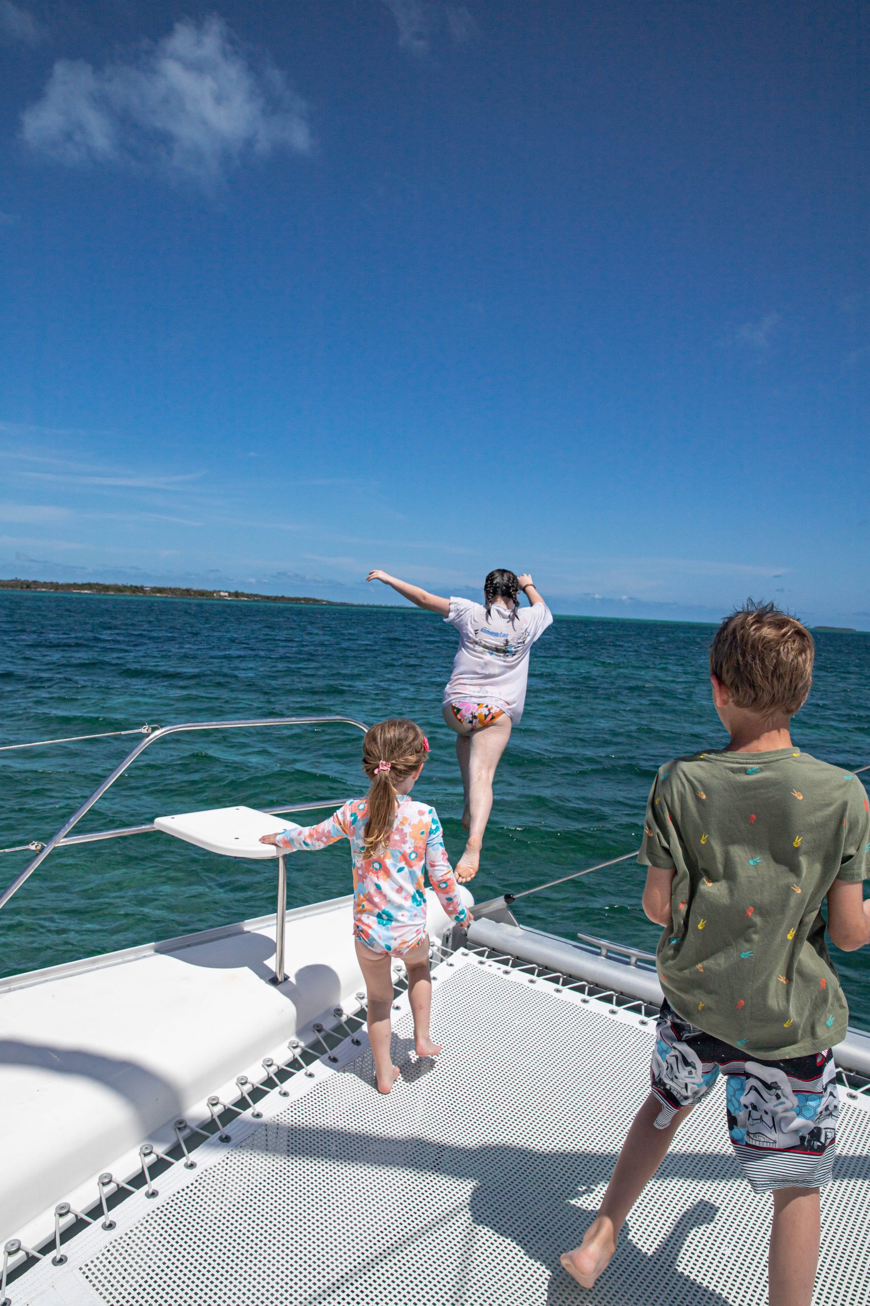 Jumping off a sailing catamaran